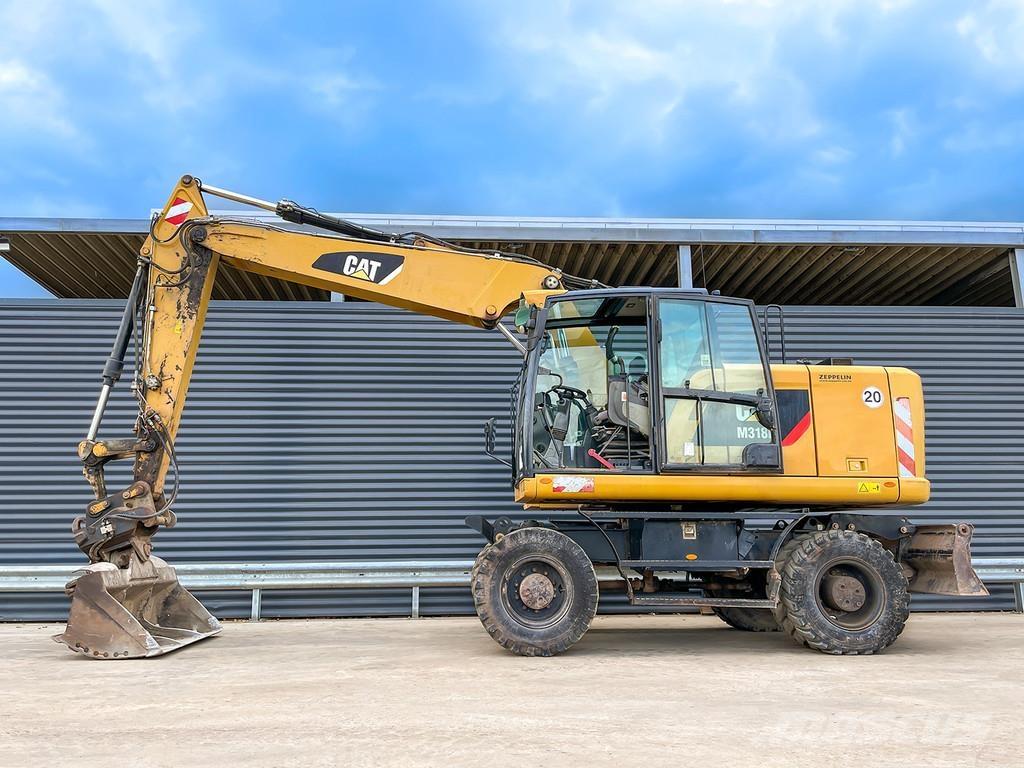 CAT M318F Wielgraafmachines