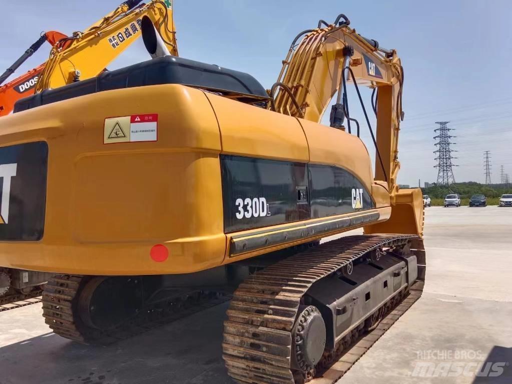 Cata-Dyne 330 Rupsgraafmachines
