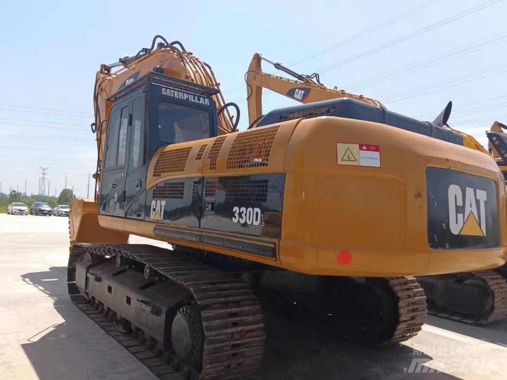 Cata-Dyne 330 Rupsgraafmachines