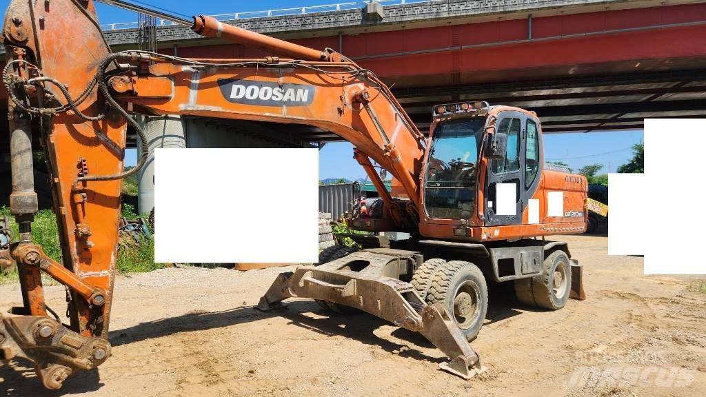 Doosan DX210WA Wielgraafmachines