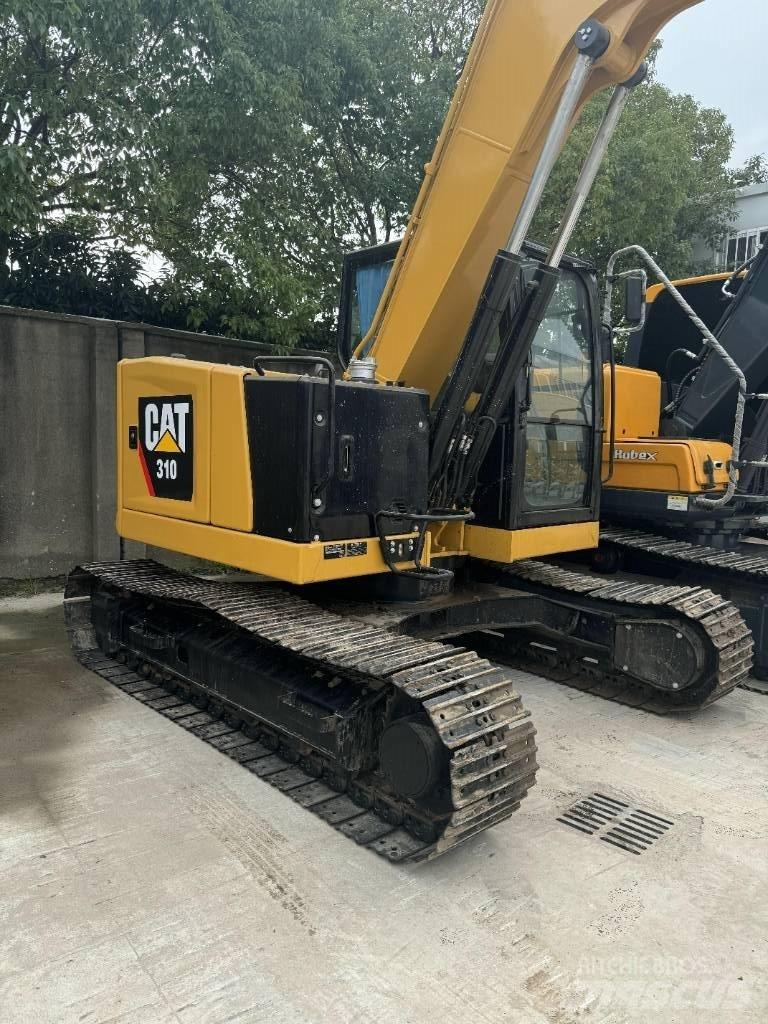 CAT 310 Trilrolwalsen