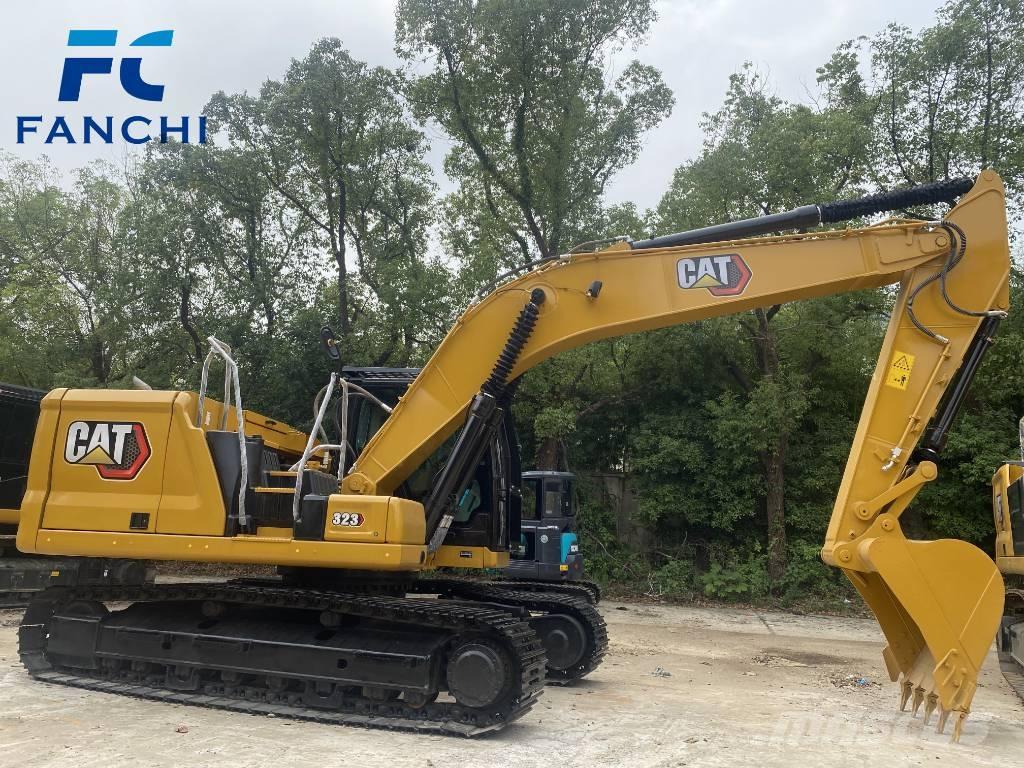CAT 323 Rupsgraafmachines