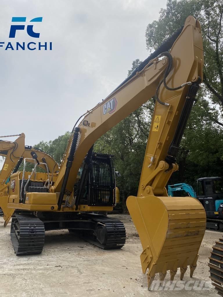 CAT 323 Rupsgraafmachines