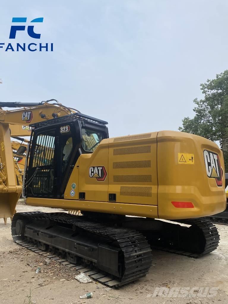 CAT 323 Rupsgraafmachines