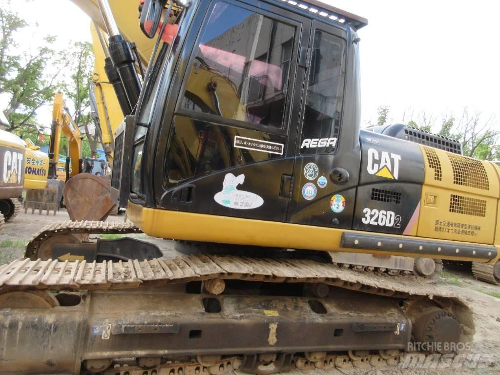 CAT 326 Rupsgraafmachines