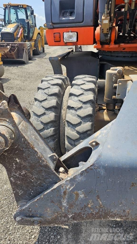 Fiat-Kobelco E215W Wielgraafmachines