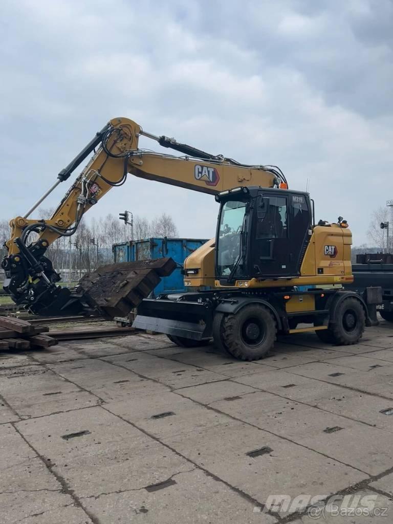 CAT M 319 Wielgraafmachines