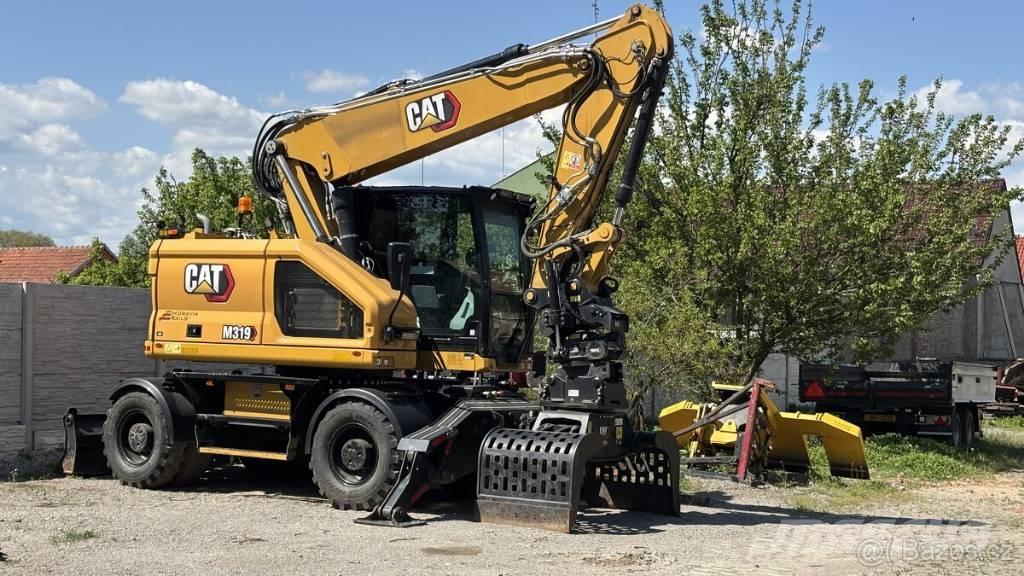 CAT M 319 Wielgraafmachines