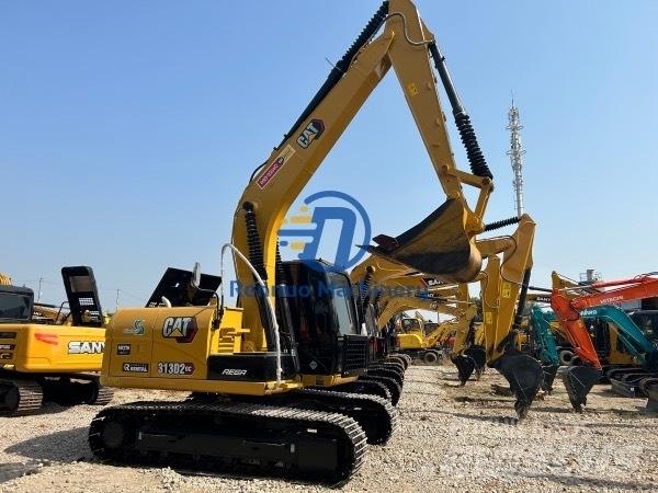 CAT 313 Midigraafmachines 7t - 12t