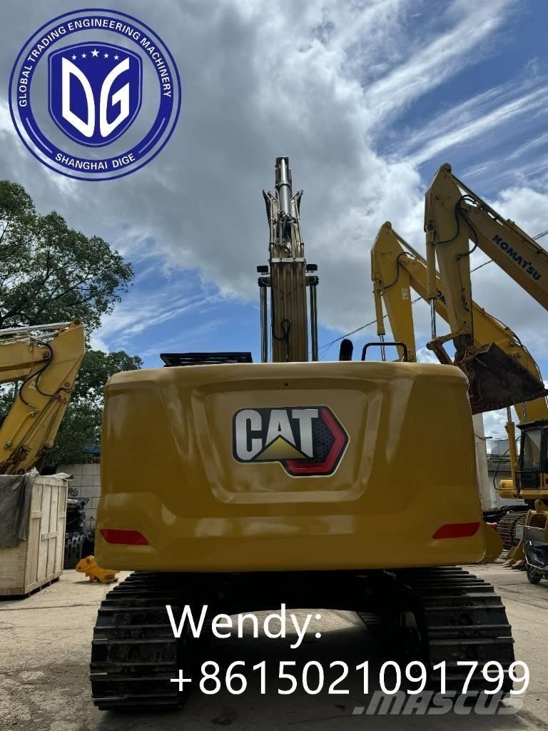 CAT 323 Rupsgraafmachines