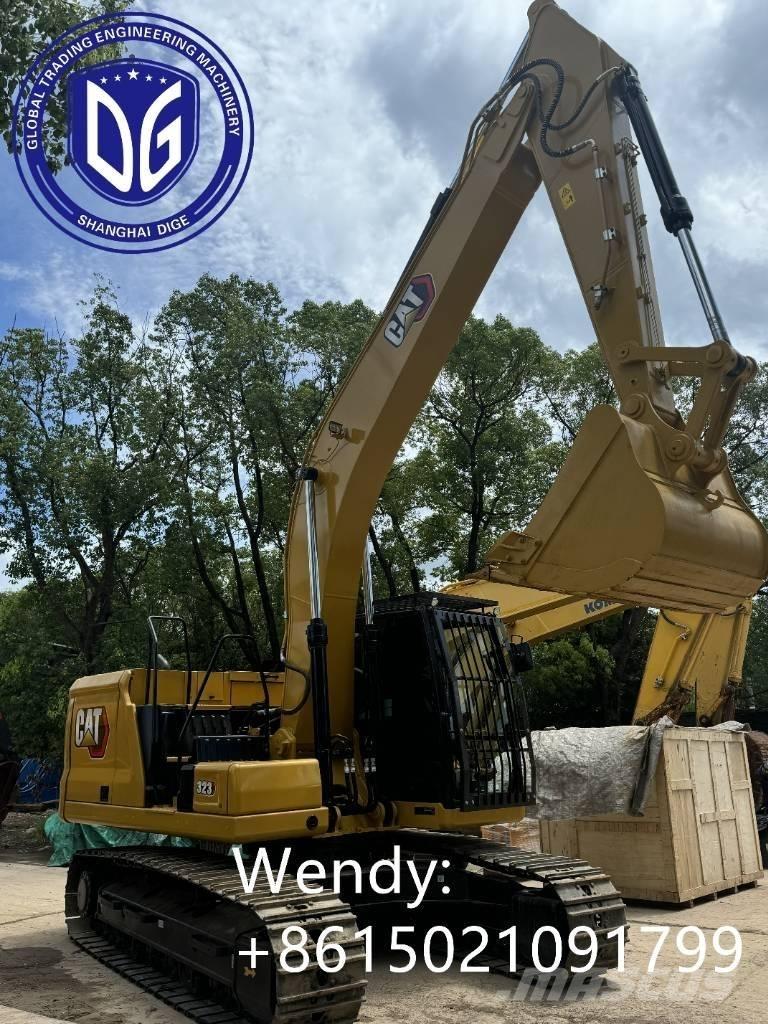 CAT 323 Rupsgraafmachines