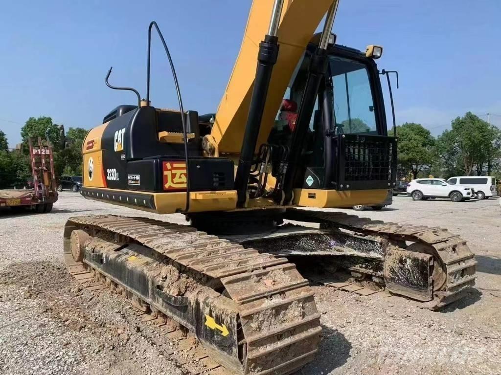 CAT 323D Rupsgraafmachines