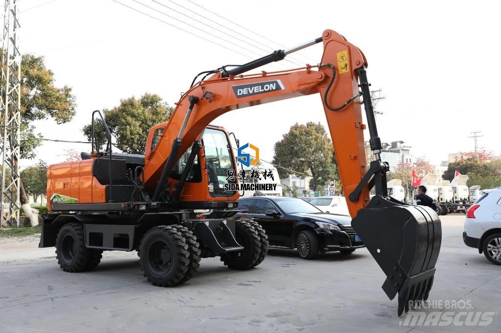 Develon DX125W Wielgraafmachines
