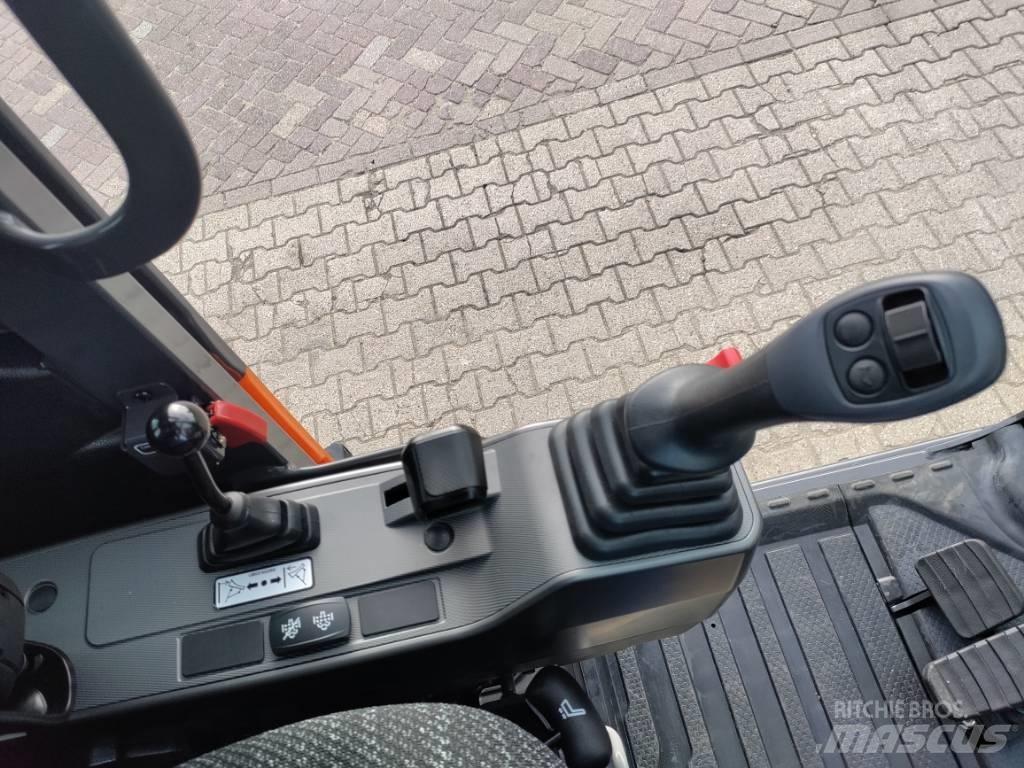 Develon DX100W-7 Wielgraafmachines