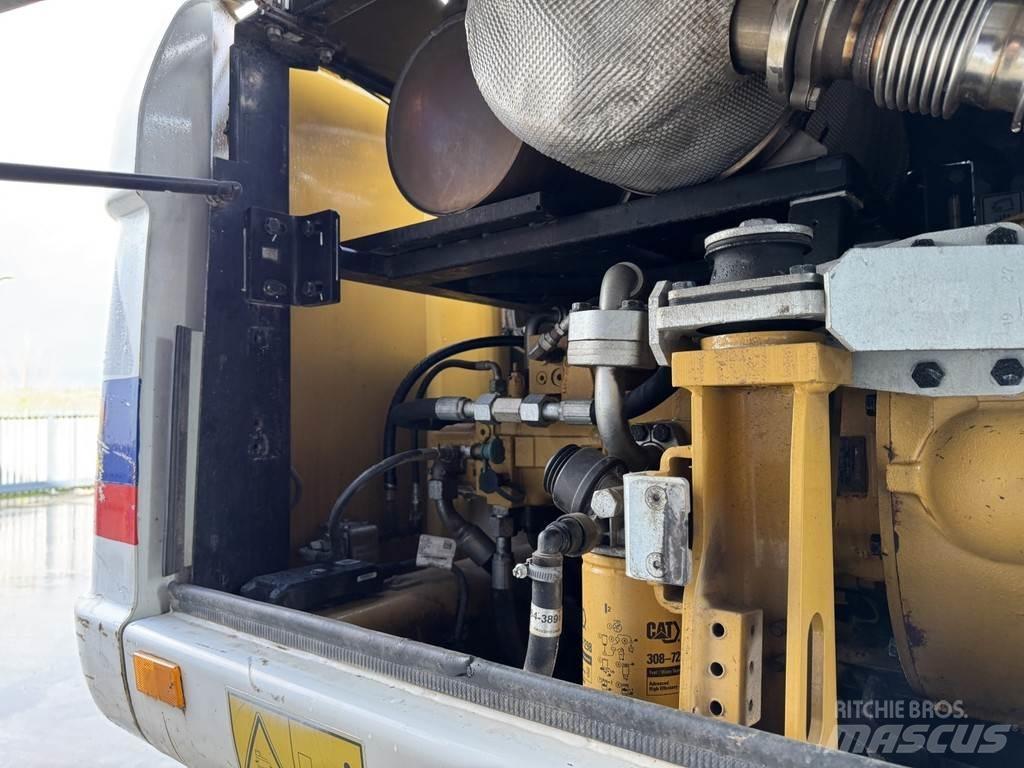 CAT M315D Wielgraafmachines