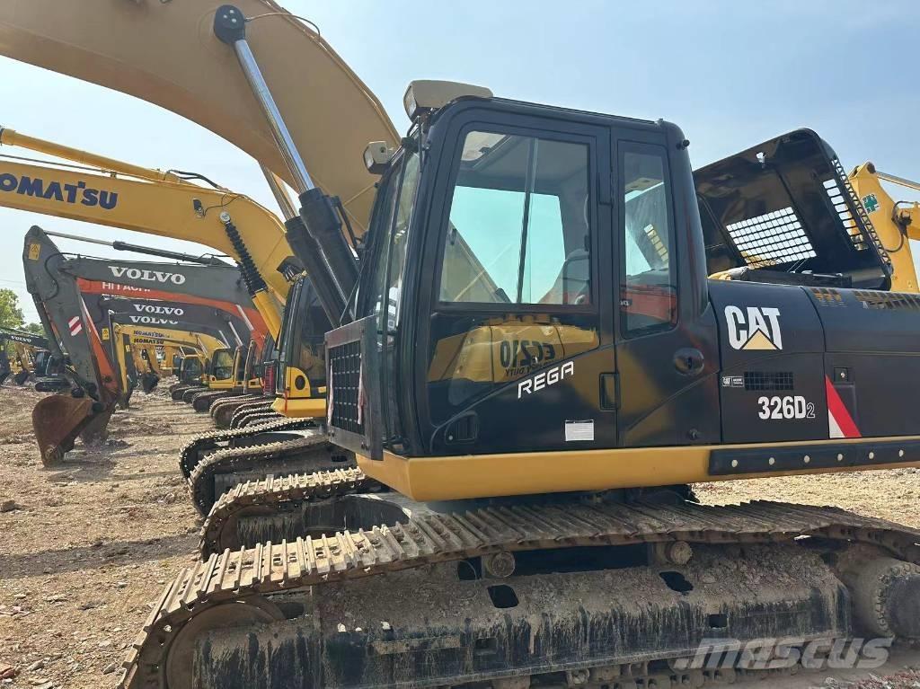 CAT 326 Rupsgraafmachines