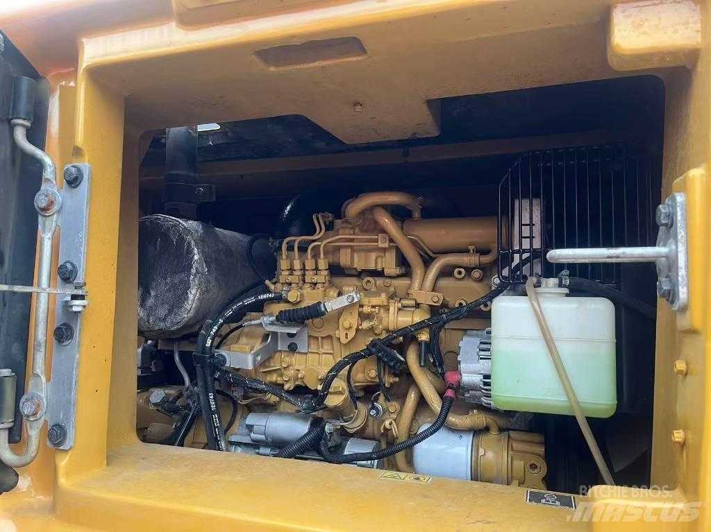 CAT 310 Rupsgraafmachines