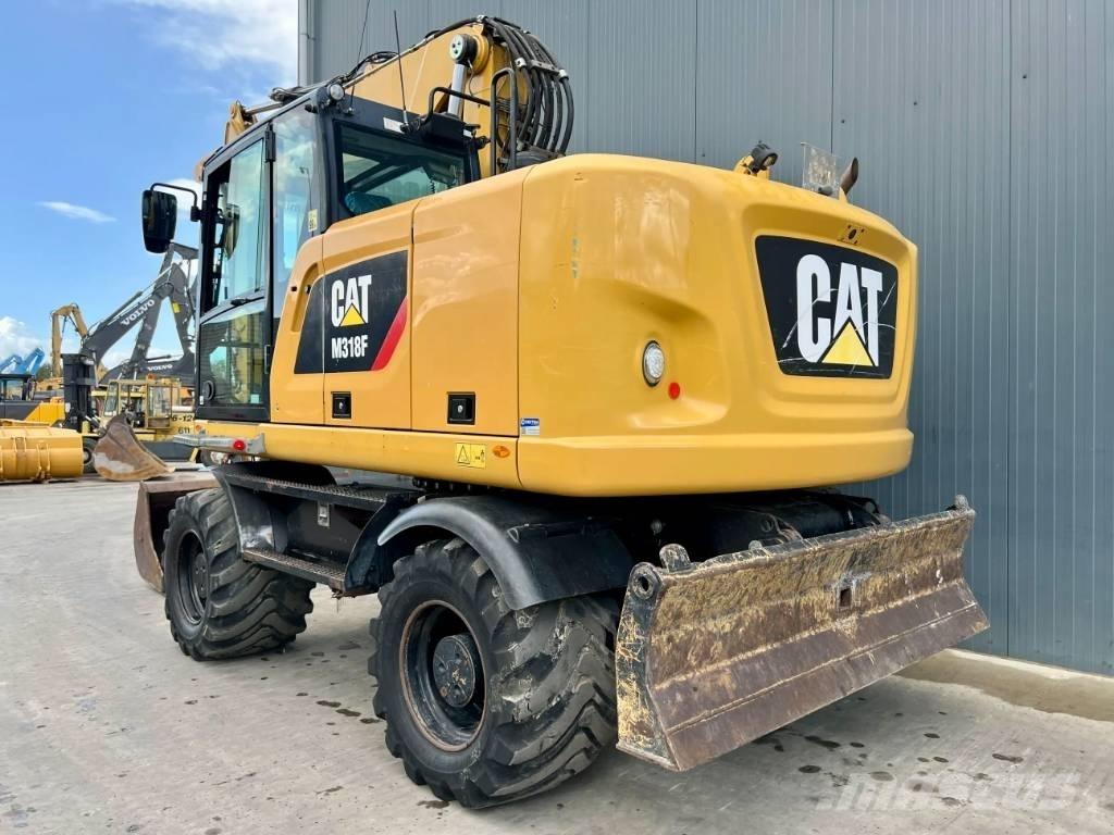 CAT M318F Wielgraafmachines