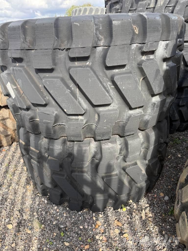 Goodyear 750/65R25 Banden, wielen en velgen