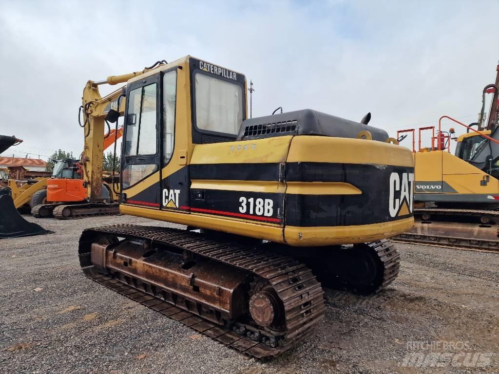 CAT 318 B L Rupsgraafmachines