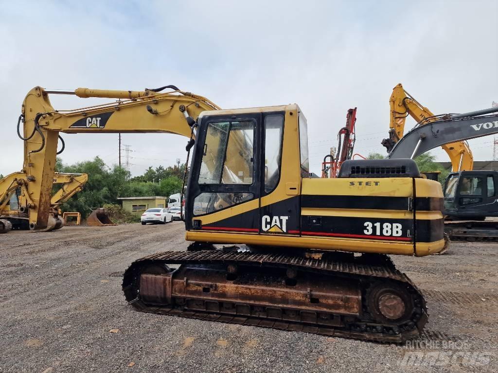 CAT 318 B L Rupsgraafmachines