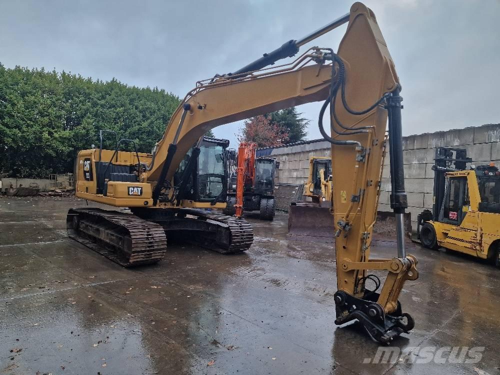 CAT 323 Rupsgraafmachines
