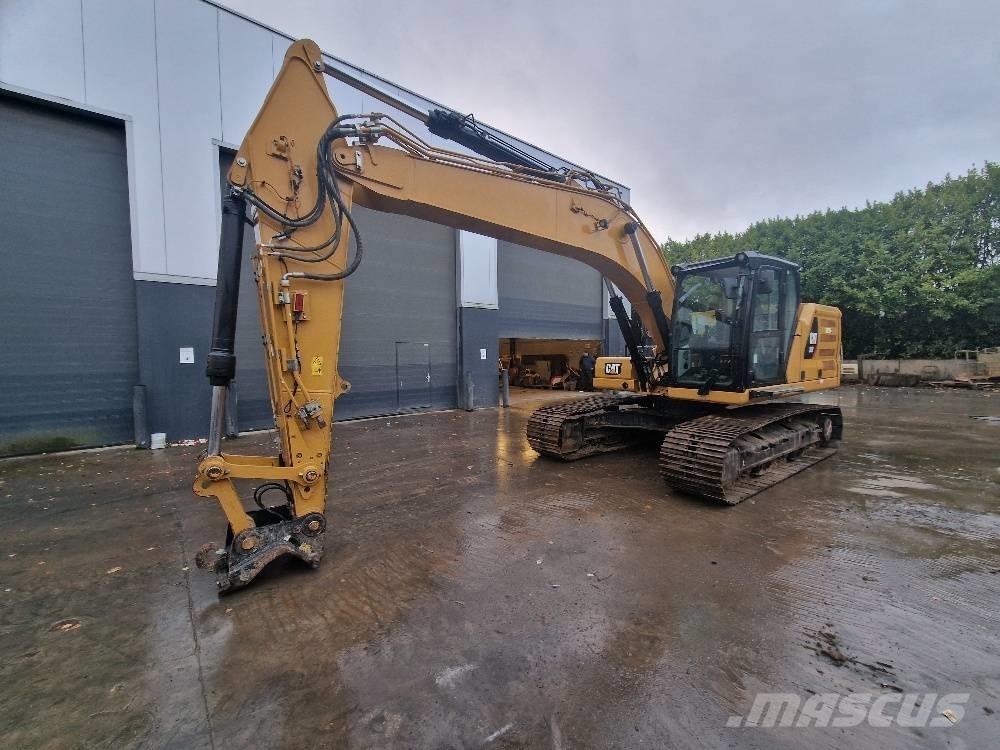 CAT 323 Rupsgraafmachines