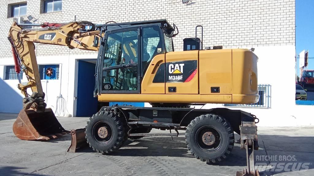 CAT M318F Wielgraafmachines