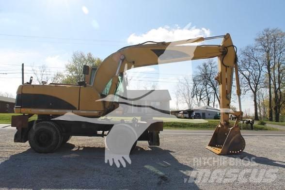 CAT M318C Wielgraafmachines