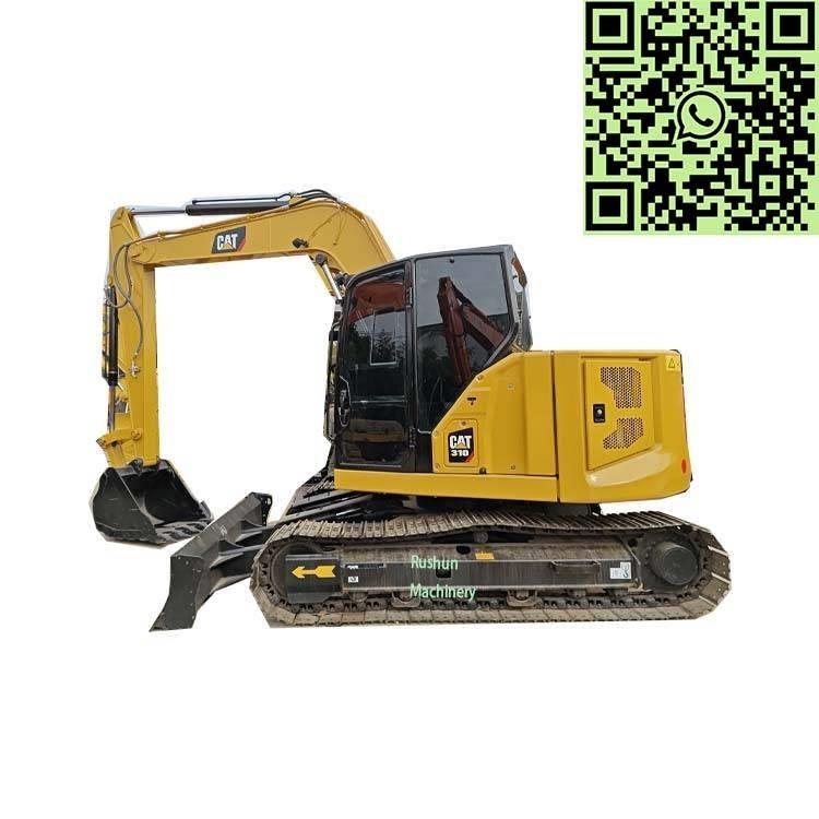 CAT 310 Rupsgraafmachines