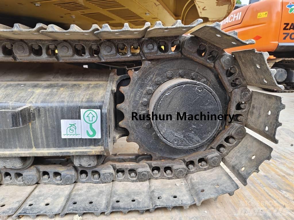 CAT 310 Rupsgraafmachines