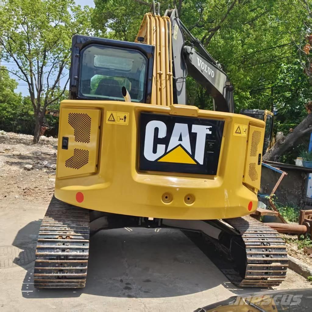 CAT 310 Rupsgraafmachines