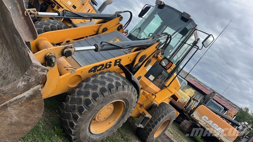 JCB 426 B Rupsbanden, kettingen en onderstel