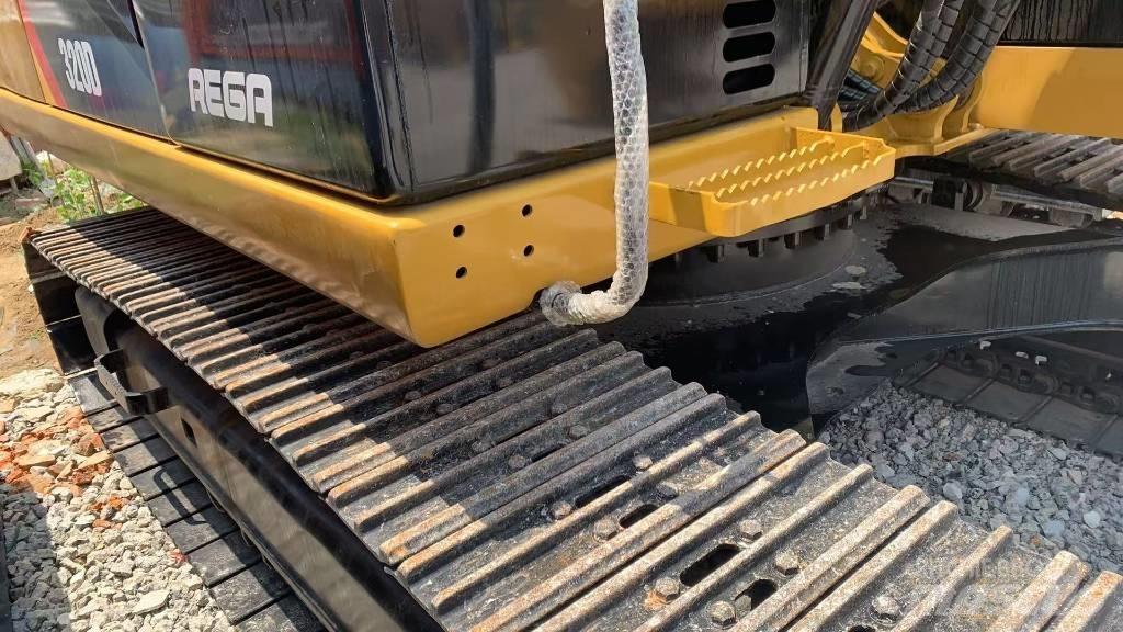 CAT 323 D Rupsgraafmachines
