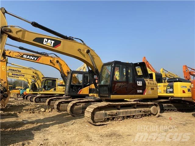 CAT 323D Rupsgraafmachines
