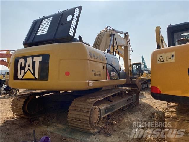 CAT 323D Rupsgraafmachines