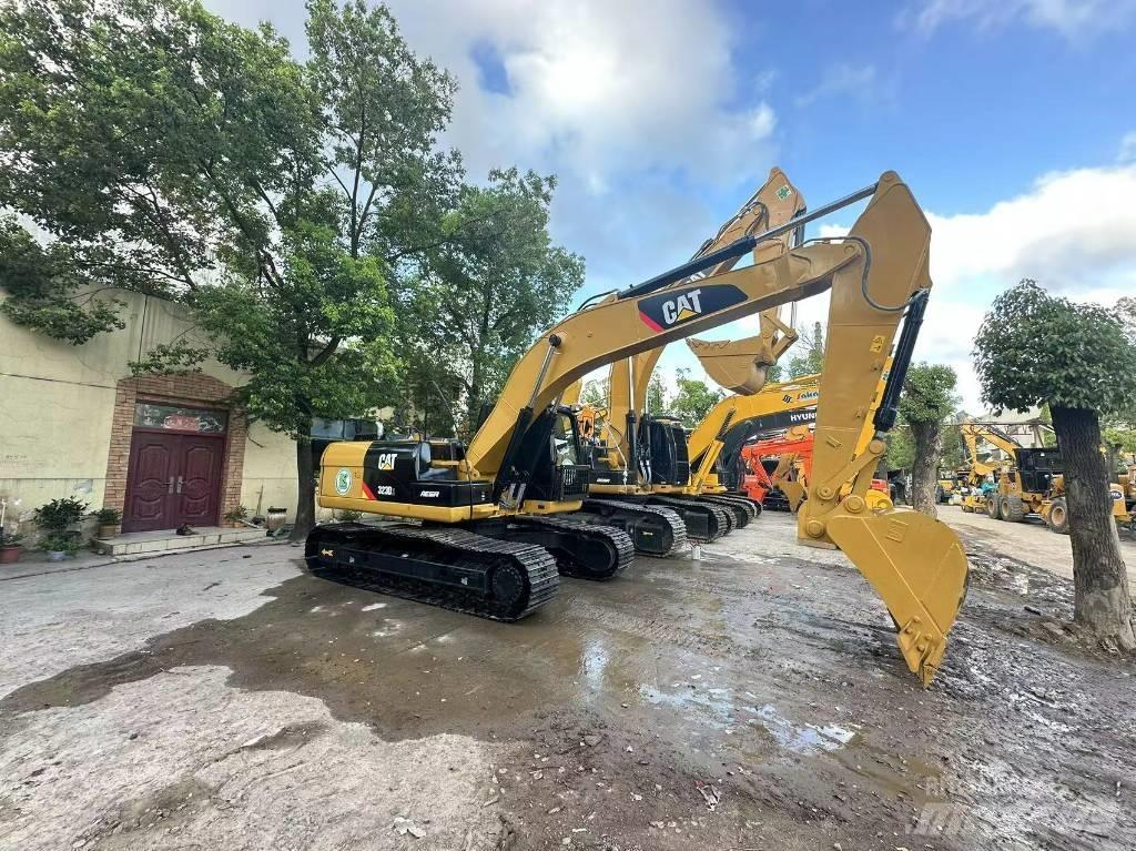 CAT 323 D Rupsgraafmachines