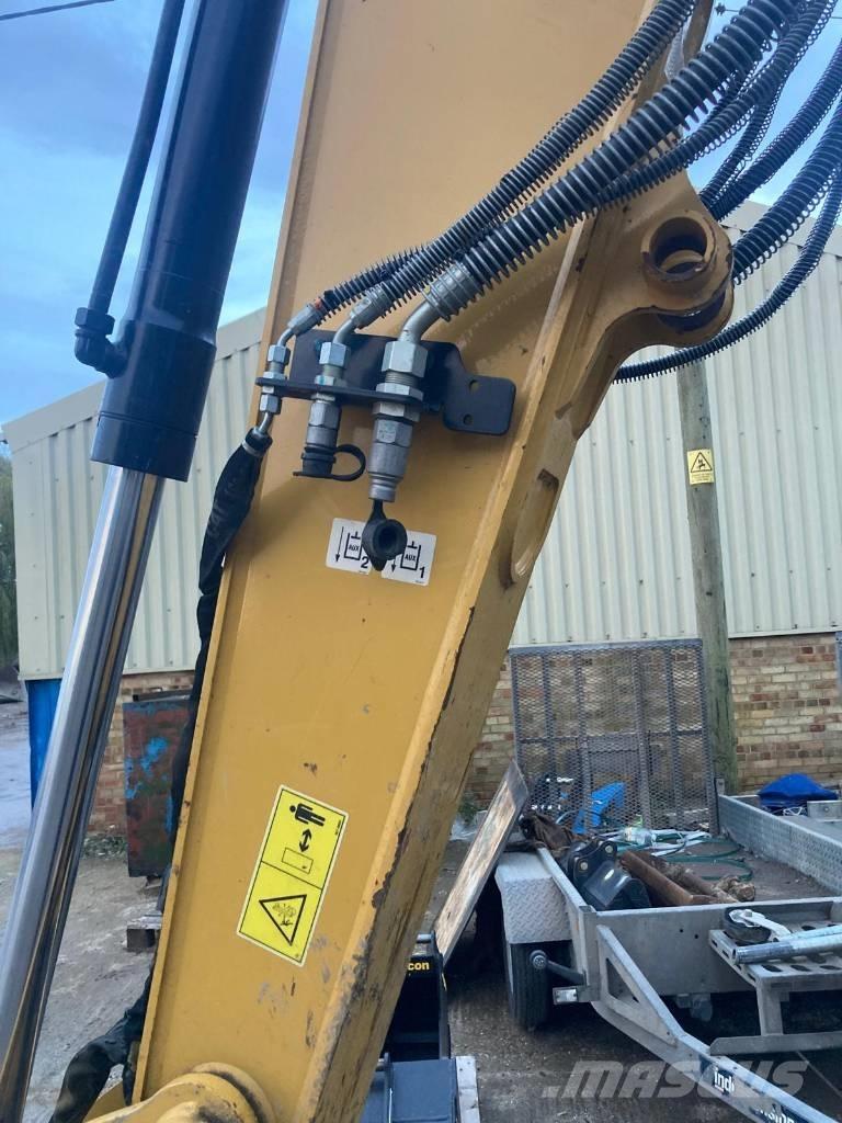 CAT 310 Rupsgraafmachines