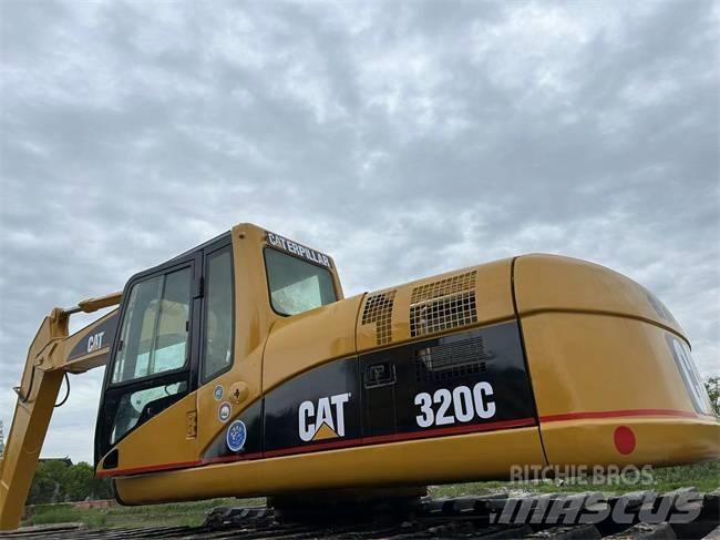 CAT 320 C Amfibische graafmachines