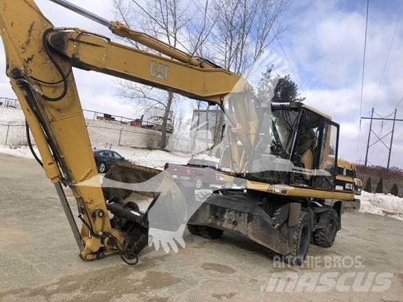 CAT M318 Wielgraafmachines