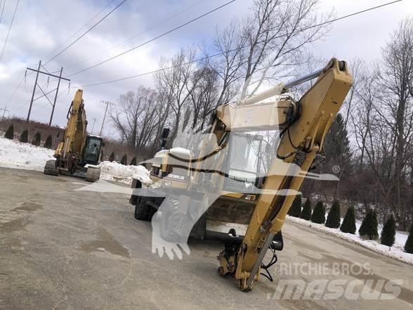 CAT M318 Wielgraafmachines