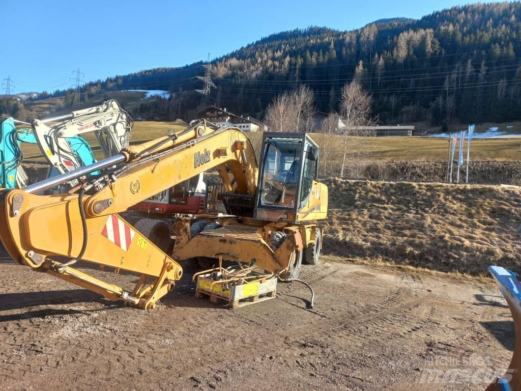 CASE 210WX Wielgraafmachines