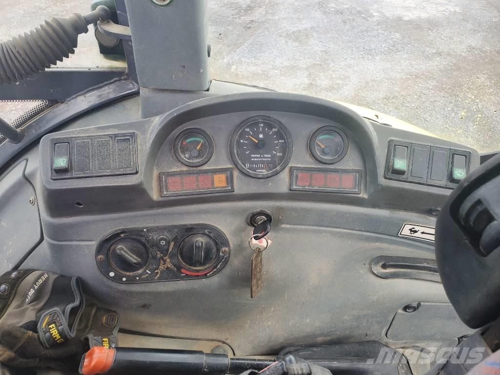New Holland LB 75 Wielgraafmachines