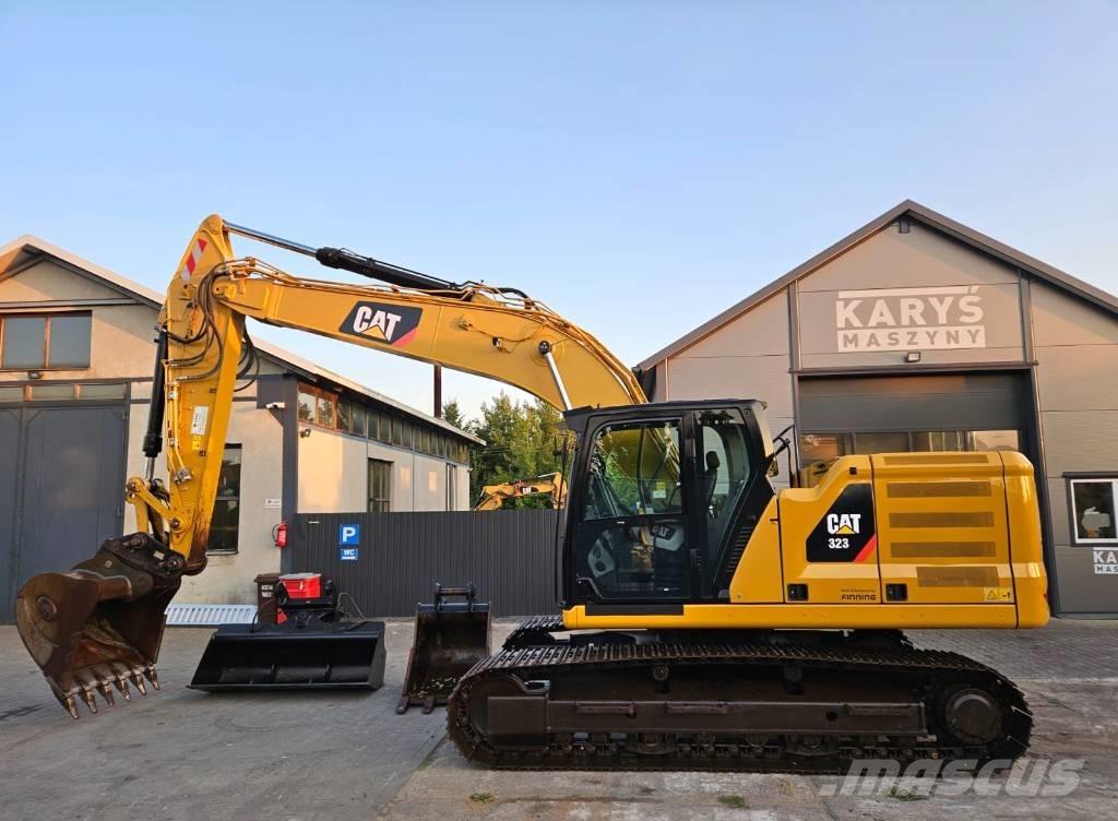 CAT 323 Rupsgraafmachines