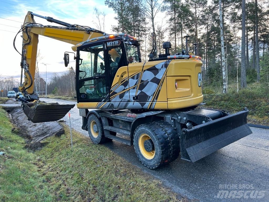 CAT M 317F Wielgraafmachines