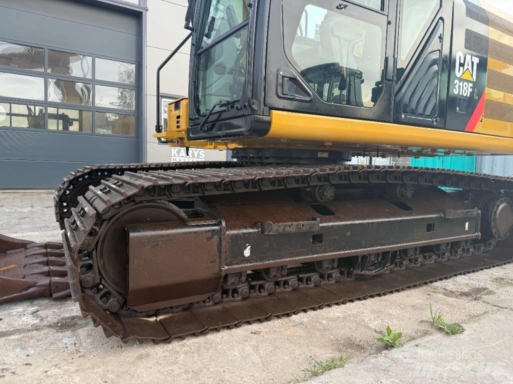 CAT 318 Rupsgraafmachines