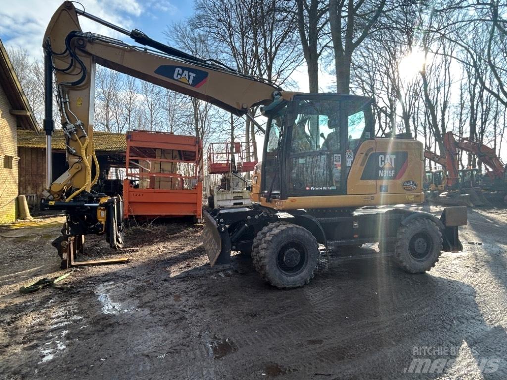 CAT M315 Wielgraafmachines