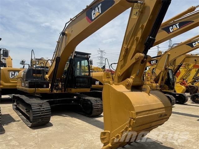 CAT 323 D L Rupsgraafmachines