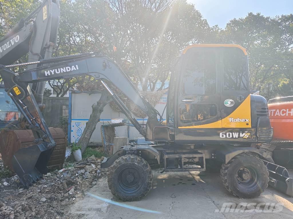 Hyundai 60 W VS Minigraafmachines < 7t