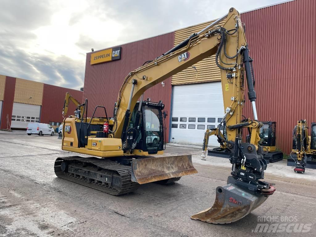 CAT 313 Rupsgraafmachines